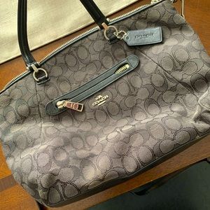 Black like new, mid sized coach purse